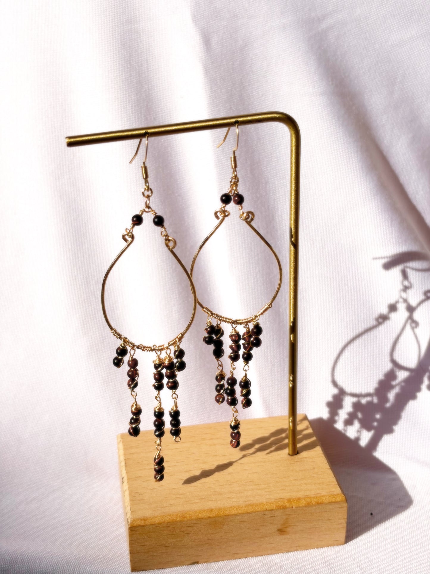 Red tiger eye gold fringe wire wrapped dangly earrings.