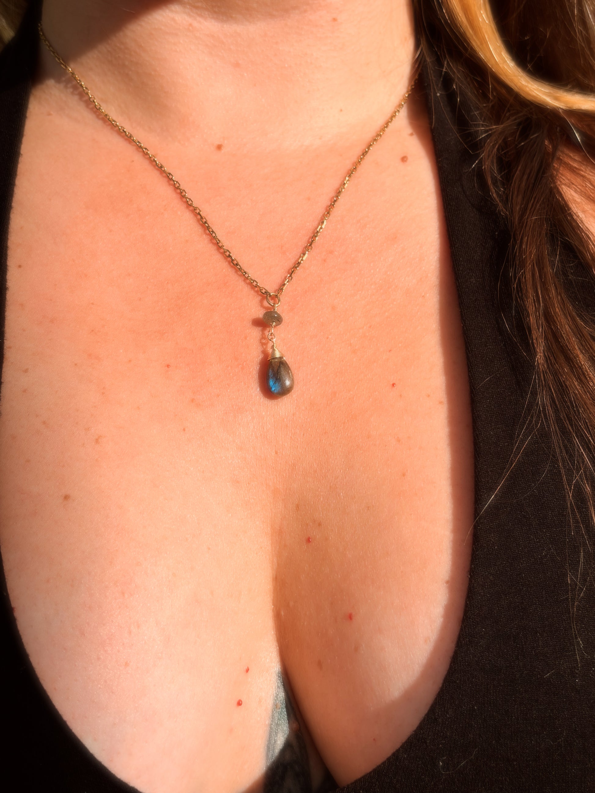Stainless Steel Cable Chain Necklace with a double Labradorite pendant on a person's neck
