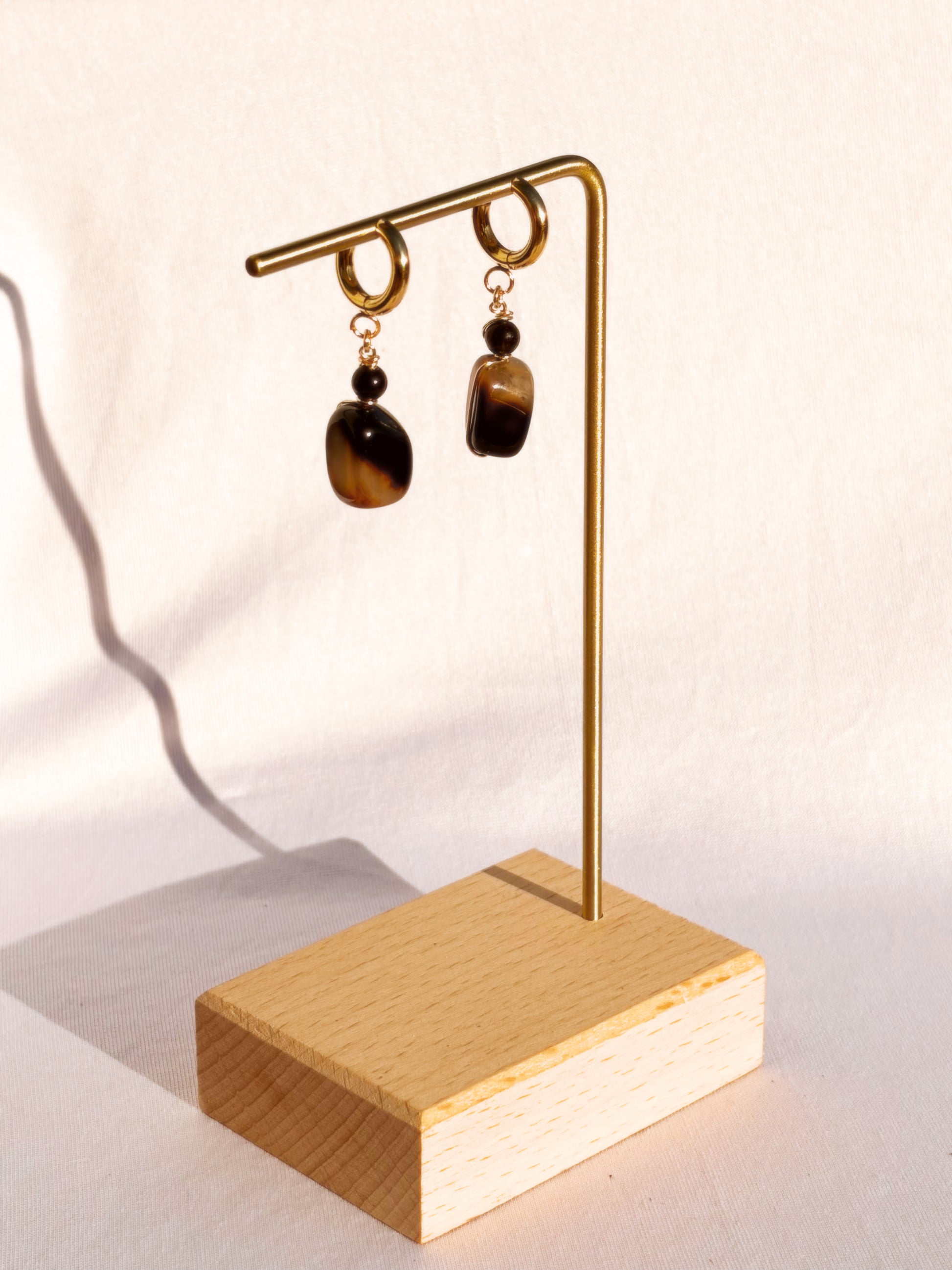 Agate and Obsidian Golden Hoop Earrings on a white background